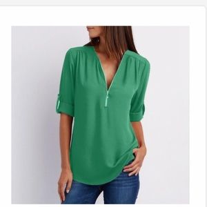 Women’s green convertible sleeve blouse